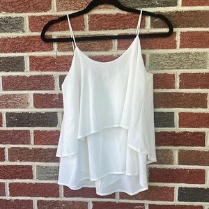 PAPER CRANE- white tank top, blousy, and flowy. Size is a small.
